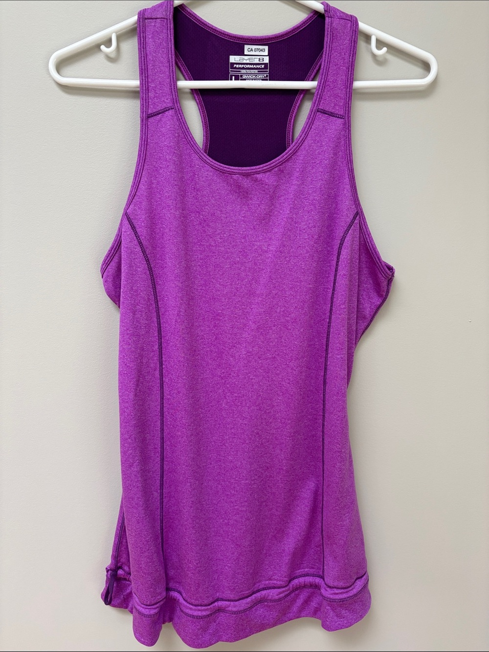 LAYER 8 | Performance sleeves less tap